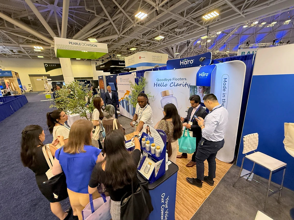 Visitors gathered around the Haro Health booth for product conversations