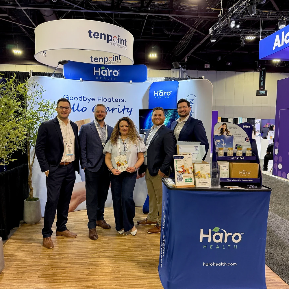 The Haro Health team at its conference booth with Haro Clear products and patient materials