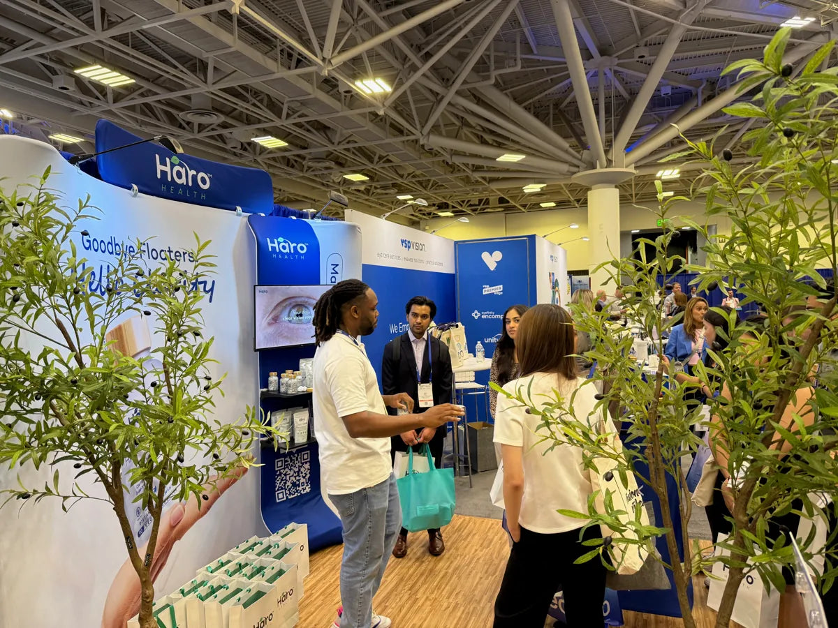 Listening to questions from conference visitors.