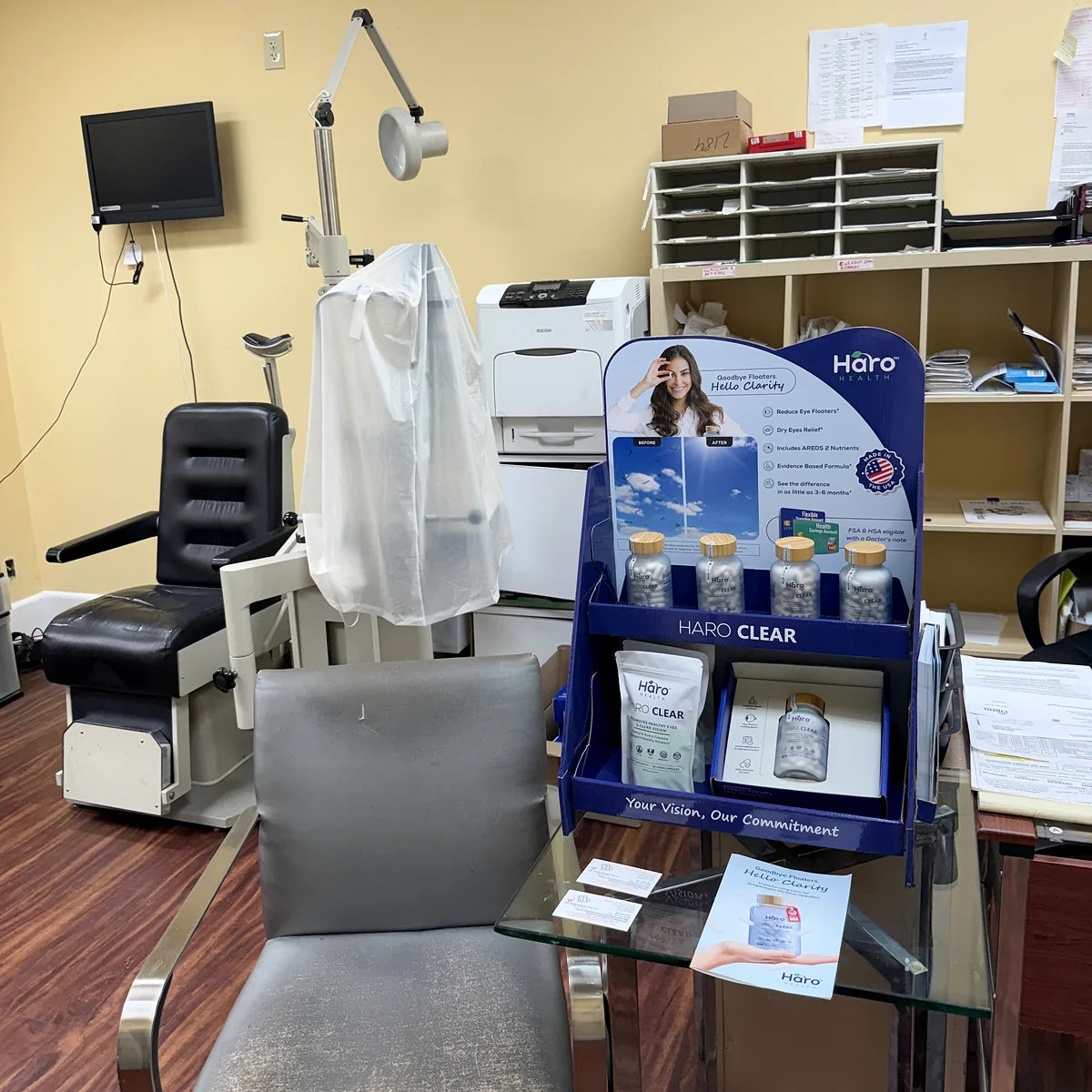 Haro Clear display beside an examination chair in an eye-care practice