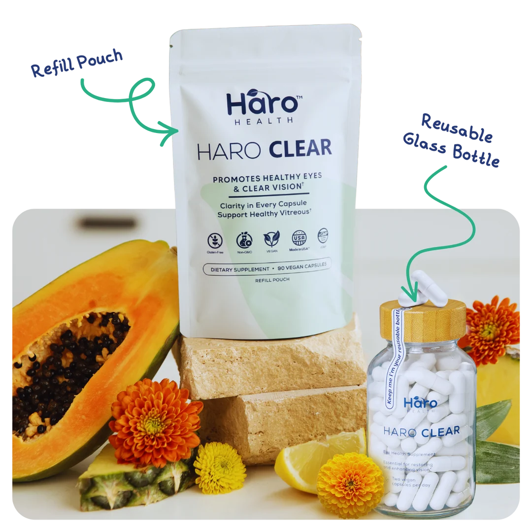 Haro Clear refill pouch and reusable glass bottle with fruit and flowers