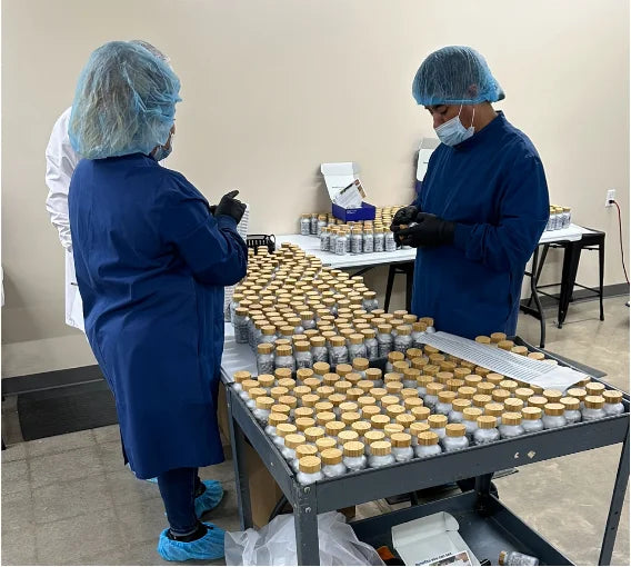 Manufacturing team inspecting Haro Clear capsules at the Oklahoma City facility